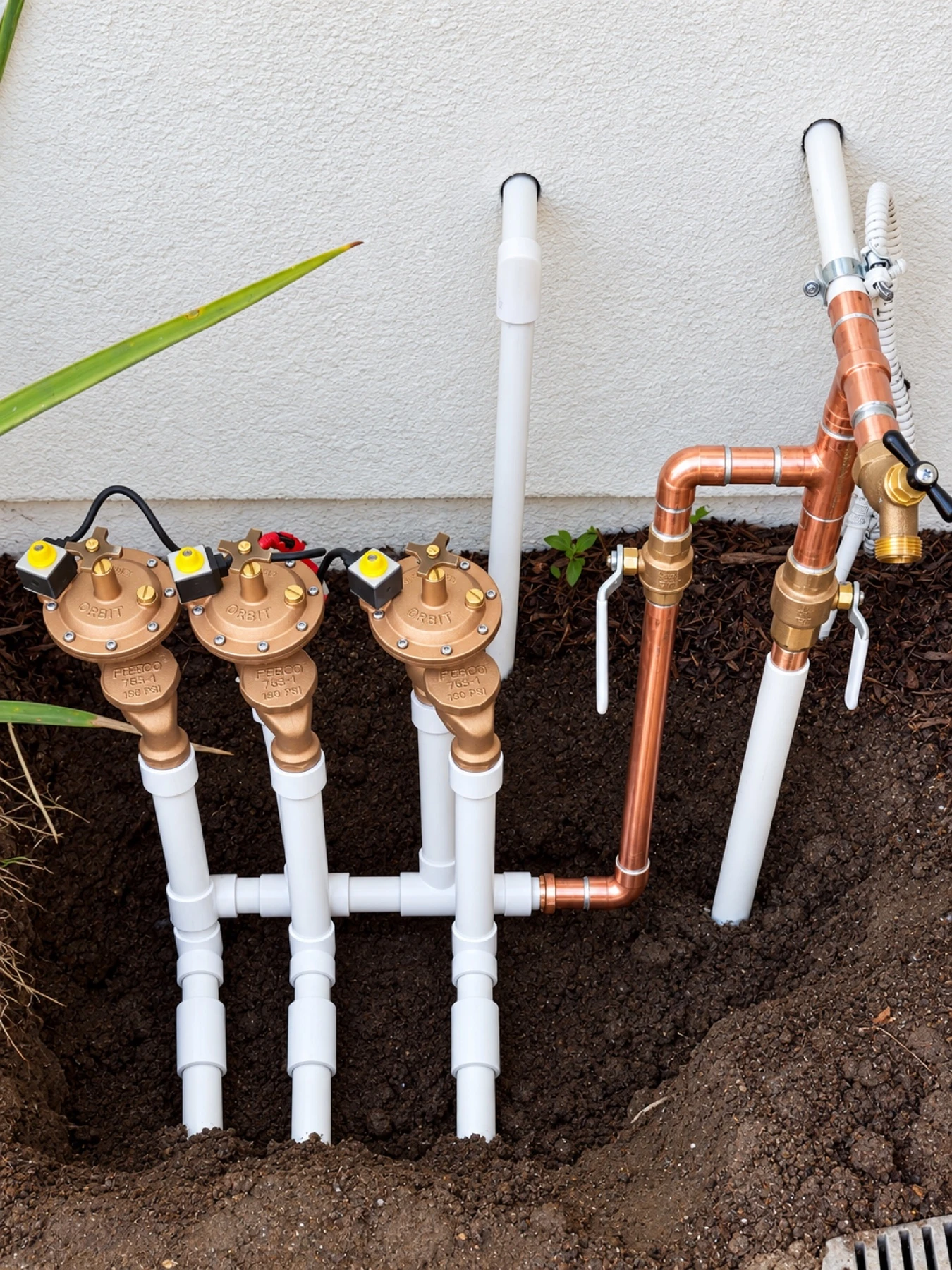 Mulhearn Plumbing water service and copper piping manifold at a home