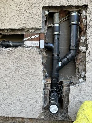 Plumbing pipe replacement in an opened wall, shared by Mulhearn Plumbing on Yelp